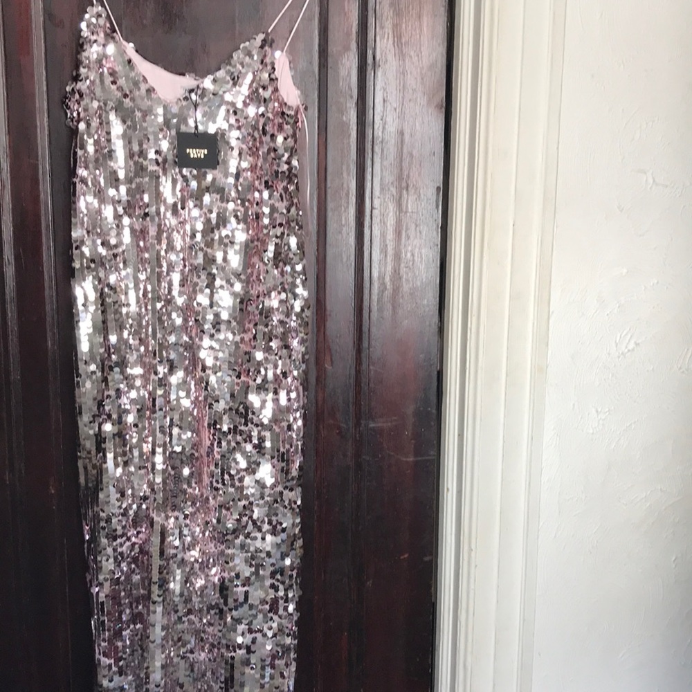 19.  New with tags, sequined dress.